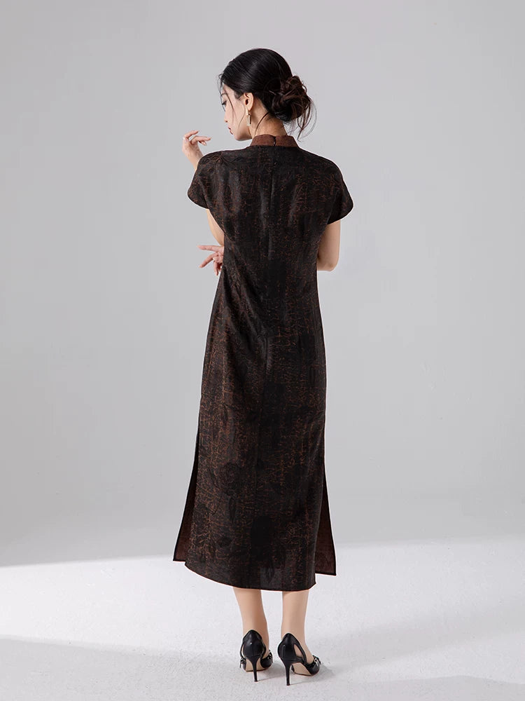 Back view of a 100% mulberry silk maxi dress showcasing its clean lines and elegant drape.