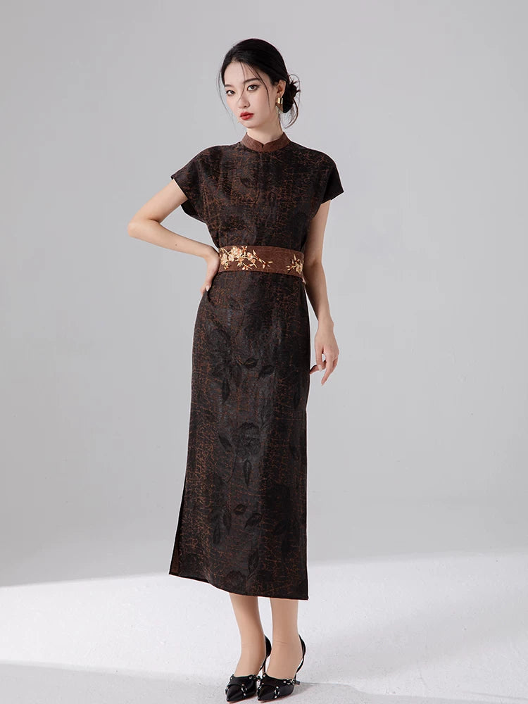Front view of an espresso brown mulberry silk maxi dress styled with an embroidered waist belt.