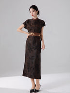 Front view of an espresso brown mulberry silk maxi dress styled with an embroidered waist belt.