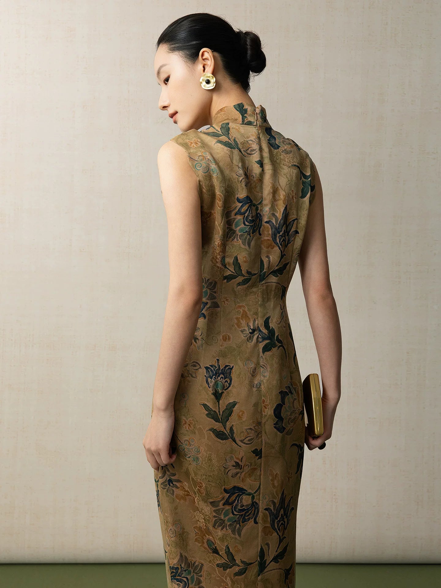 Back view of a sleeveless mulberry silk qipao dress with floral print