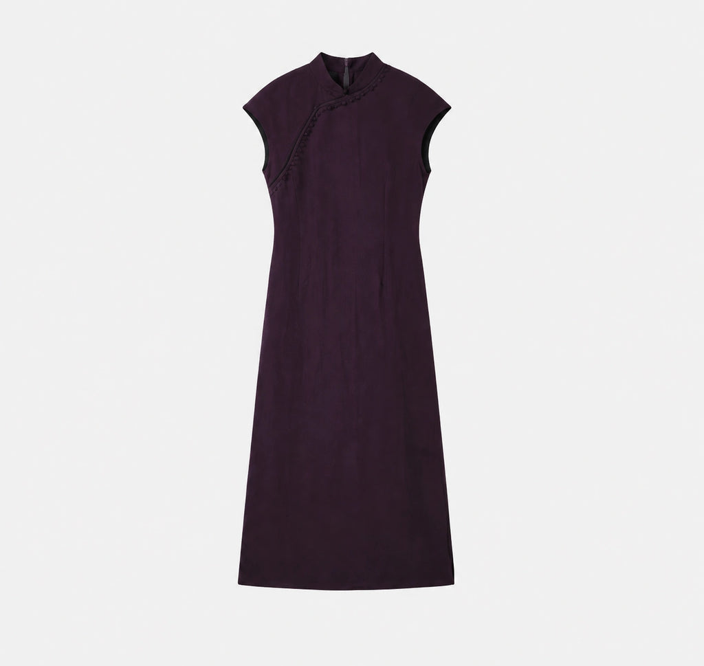 Front view of an aubergine gambiered silk qipao dress with cap sleeves and a Mandarin collar.