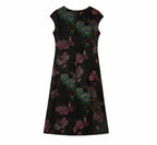 Back view of the black hydrangea mulberry silk midi dress with a concealed zipper.