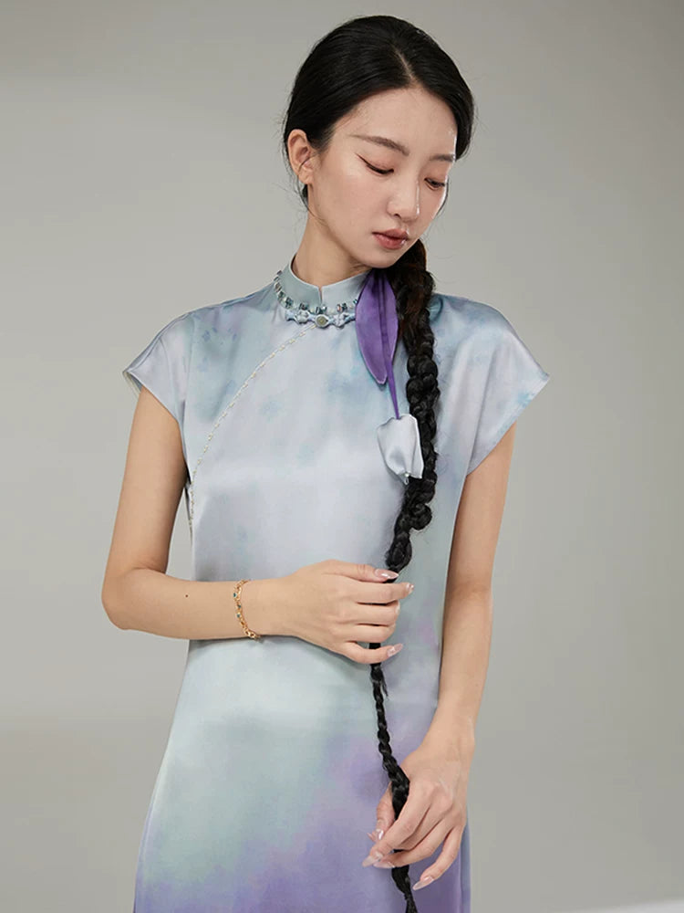 Close-up of the Gambiered Silk Lavender Sky gradient mandarin collar maxi dress with soft watercolor-inspired tones.