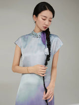 Close-up of the Gambiered Silk Lavender Sky gradient mandarin collar maxi dress with soft watercolor-inspired tones.