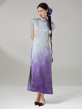 Model wearing the Gambiered Silk Lavender Sky gradient maxi dress with a mandarin collar and cap sleeves.