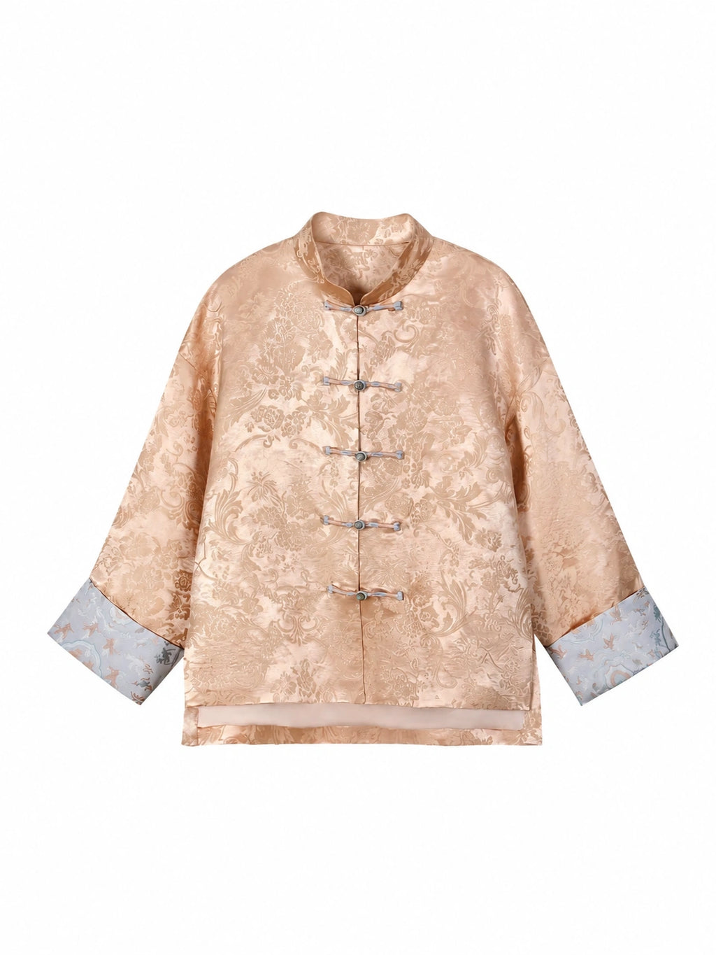 Front view of a blush pink jacquard jacket with long straight sleeves and pale blue cuffs