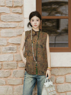 Model wearing a relaxed brown abstract-patterned mulberry silk sleeveless top