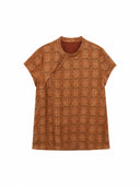 Front view of a brown patterned mulberry silk pullover top with short straight sleeves