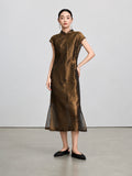 Model wearing the bronze-brown shimmering butterfly qipao with its coordinating slip