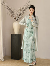 Model wearing the Celadon Mist long sun protection jacket by Gambiered Silk.