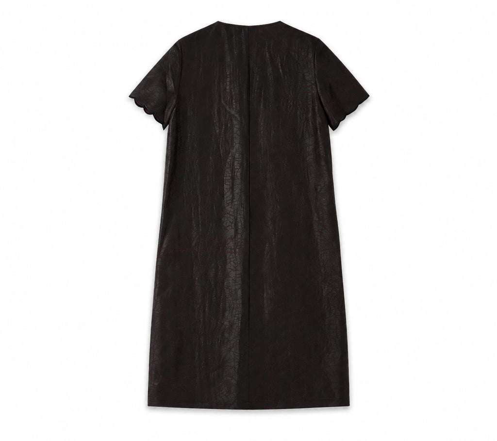 Back view of the dark aubergine 24-momme Xiangyunsha silk H-line dress with short scalloped sleeves