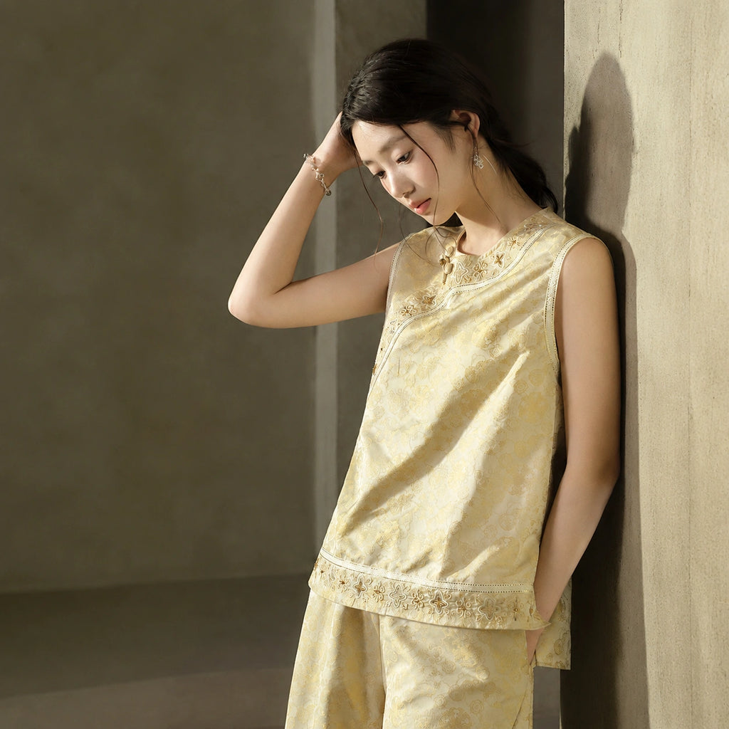 Side view showing the relaxed fit, dimensional floral jacquard, embroidered hem and side slit