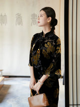 Side profile of elegant floral velvet Mandarin collar midi dress