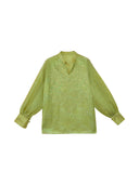 Front flat lay of a celadon green embroidered mulberry silk blouse with long sleeves and a Mandarin collar.