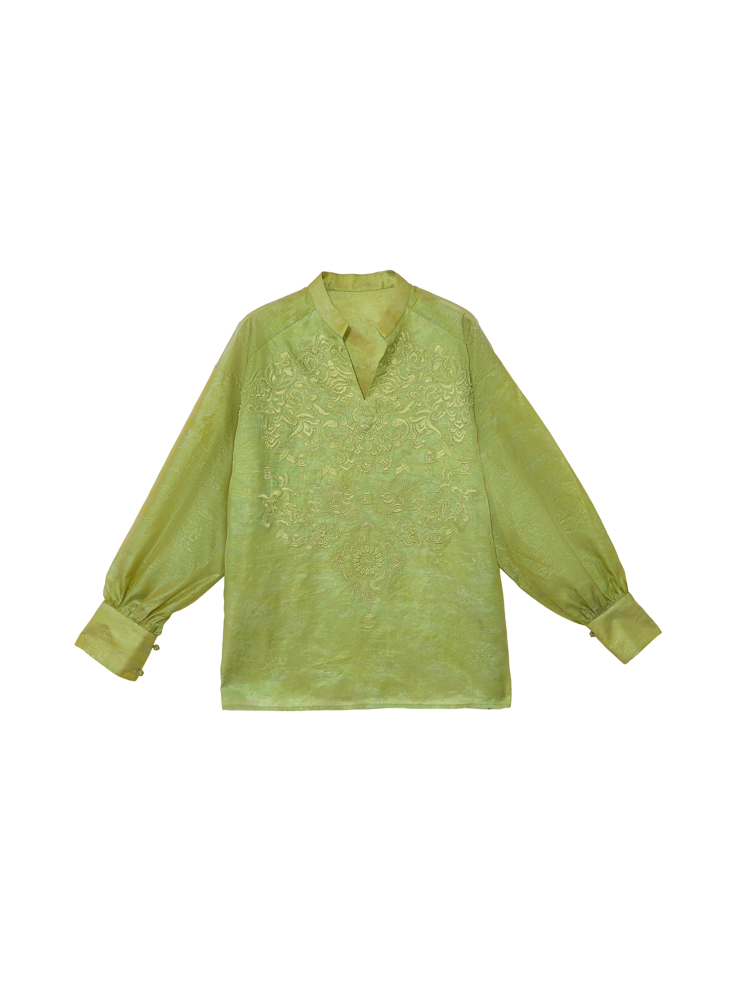 Front flat lay of a celadon green embroidered mulberry silk blouse with long sleeves and a Mandarin collar.
