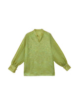 Front flat lay of a celadon green embroidered mulberry silk blouse with long sleeves and a Mandarin collar.