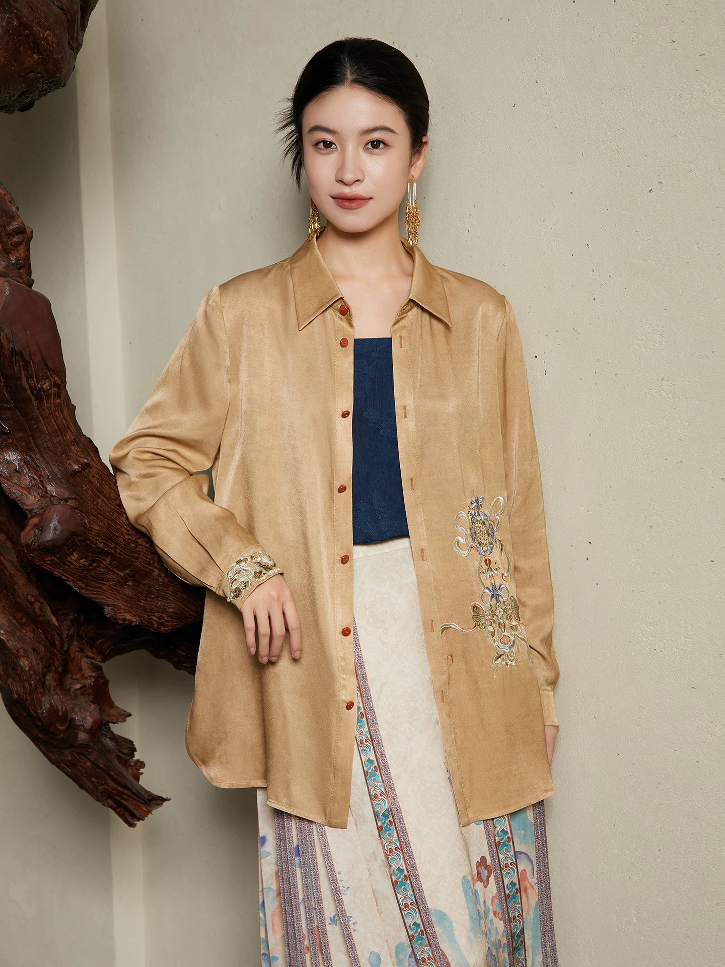 Three-quarter view of the Embroidered Viscose Shirt highlighting the embroidered detail and fluid drape.