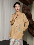 Lifestyle styling of the Embroidered Viscose Shirt paired with a printed skirt.