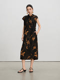 Front view of a black floral mulberry silk A-line dress with stand collar and side pockets