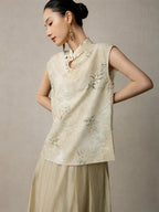 Front view of the Warm Sand floral sleeveless Chinese style top with mandarin collar from Gambiered Silk.