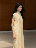 Side view of floral textured Mandarin collar midi dress with relaxed silhouette