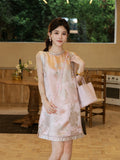 Front model view of Gambiered Silk floral satin dress with round neck and contrast trim