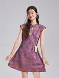 Model displaying the gently flared silhouette of an orchid-purple floral silk dress.