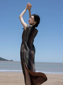 Back view of a flowing Mulberry Silk maxi dress with side slit