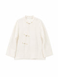 Ivory Chinese-inspired silk organza shirt with mandarin collar and decorative frog closures