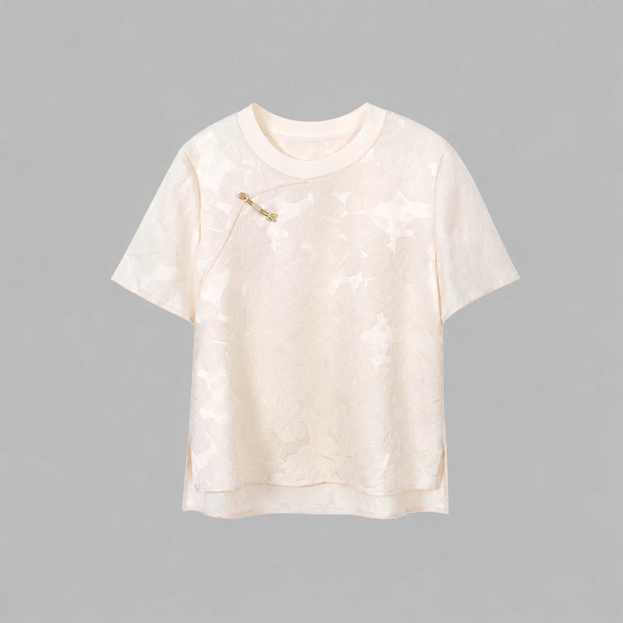 Front view of an ivory Chinese-inspired mulberry silk top with a relaxed fit