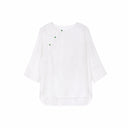 Front view of an ivory Chinese-inspired silk top with an asymmetrical front detail