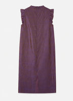 Back view of the iridescent silk jacquard dress showing flutter sleeves, a concealed zipper and center slit.