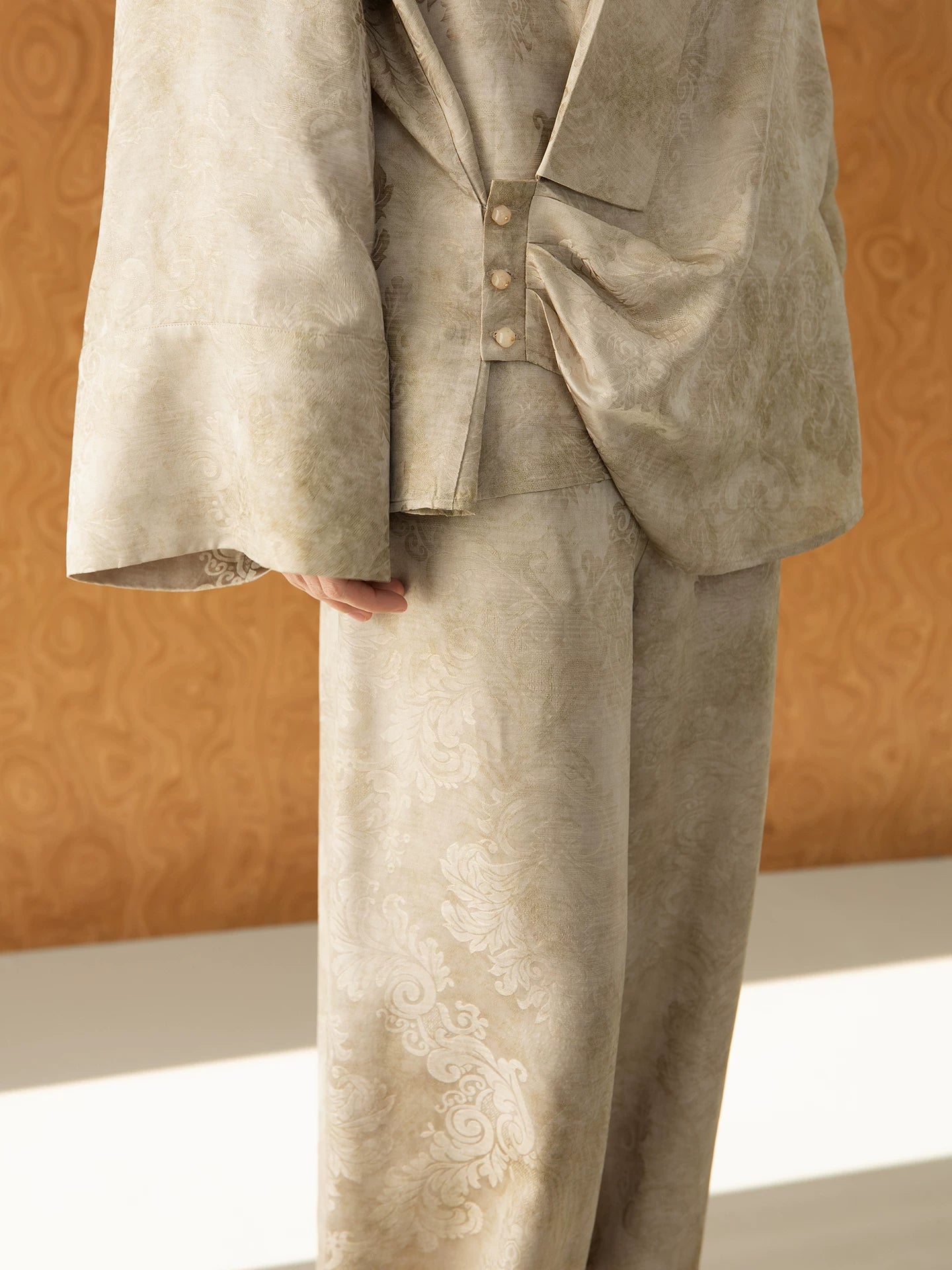 Close-up of jacquard texture and handmade button details