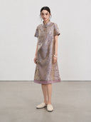 Full-length front view of the Jiangnan-inspired silk qipao with short sleeves and layered hem