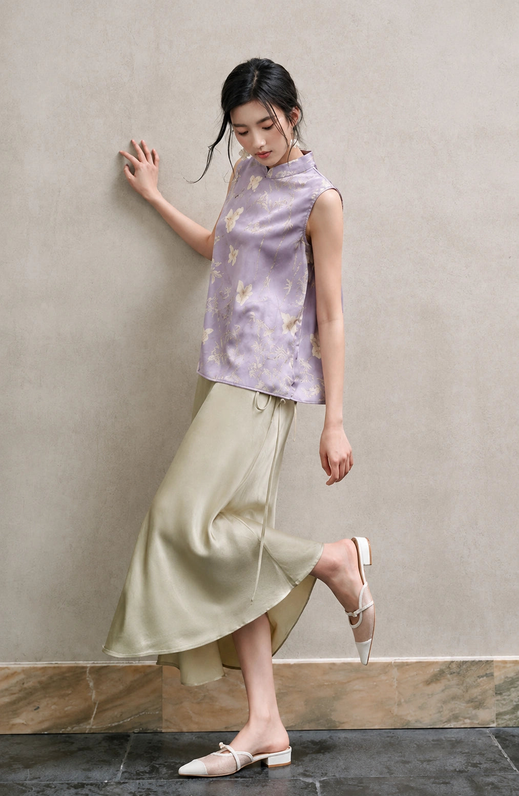 Model wearing the lavender bamboo and butterfly vest in a relaxed A-line silhouette