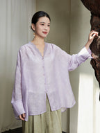Front view of the Lavender Lyocell Lace Trim V-Neck Blouse by Gambiered Silk featuring a relaxed silhouette and delicate lace neckline.