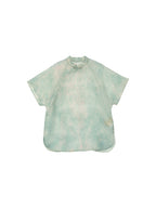 Flat lay of the light celadon silk cheongsam top featuring a Mandarin collar, frog closure and relaxed silhouette.