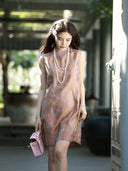 Full-length lifestyle view of a Gambiered Silk luminous brocade dress in lilac pink and gold.