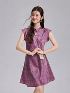 Front view of a Gambiered Silk floral dress with extended-shoulder sleeves and a keyhole neckline.