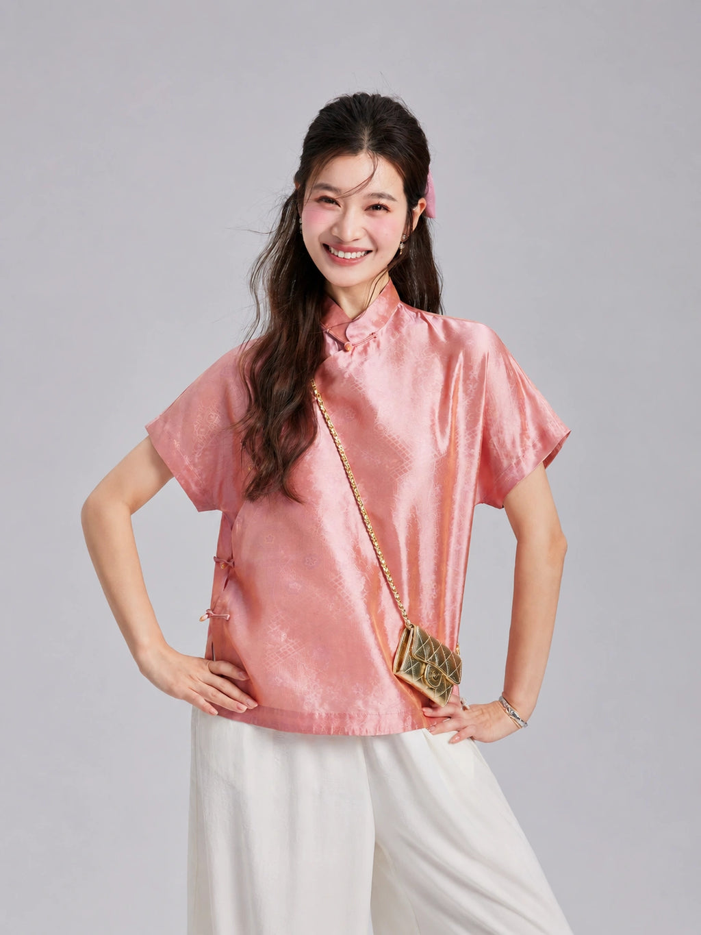 Front view of a Gambiered Silk mulberry silk top featuring short sleeves, a Mandarin collar and geometric motifs