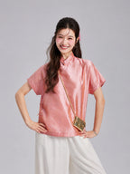 Front view of a Gambiered Silk mulberry silk top featuring short sleeves, a Mandarin collar and geometric motifs