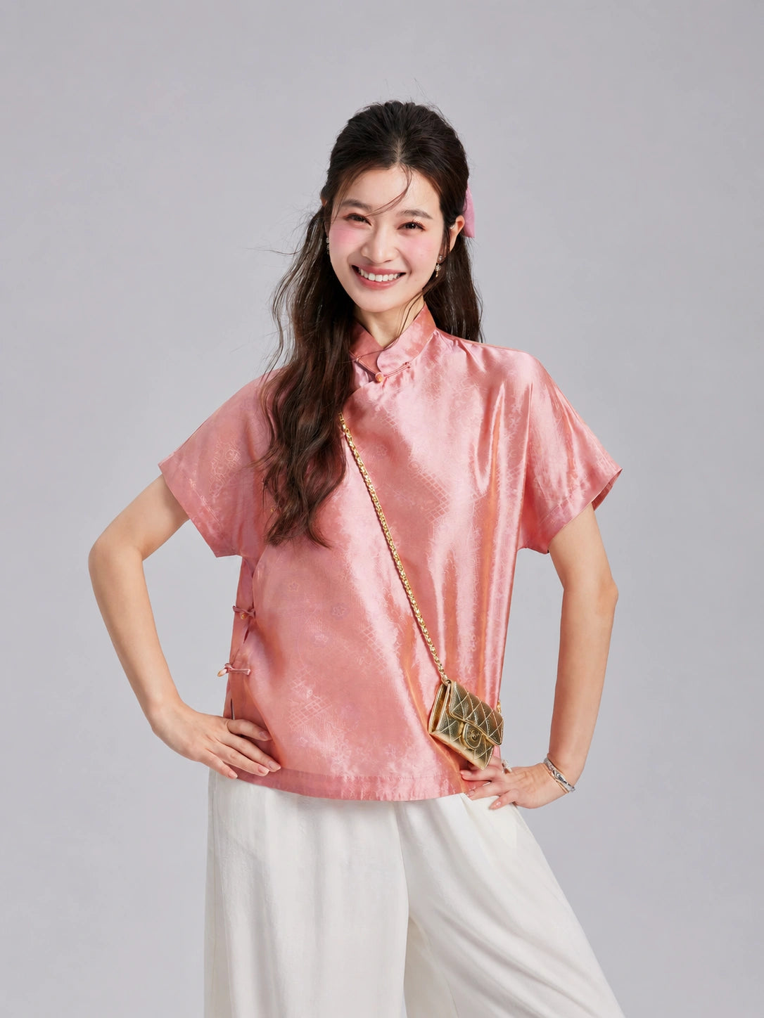 Front view of a Gambiered Silk mulberry silk top featuring short sleeves, a Mandarin collar and geometric motifs