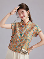 Gambiered Silk Shu brocade top featuring a Mandarin collar, asymmetric closure, contrast piping and frog buttons