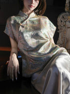 Close-up of the mandarin collar and decorative closure on a patterned silk-blend top