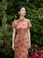 Close portrait of silk cheongsam dress with cherry blossom print