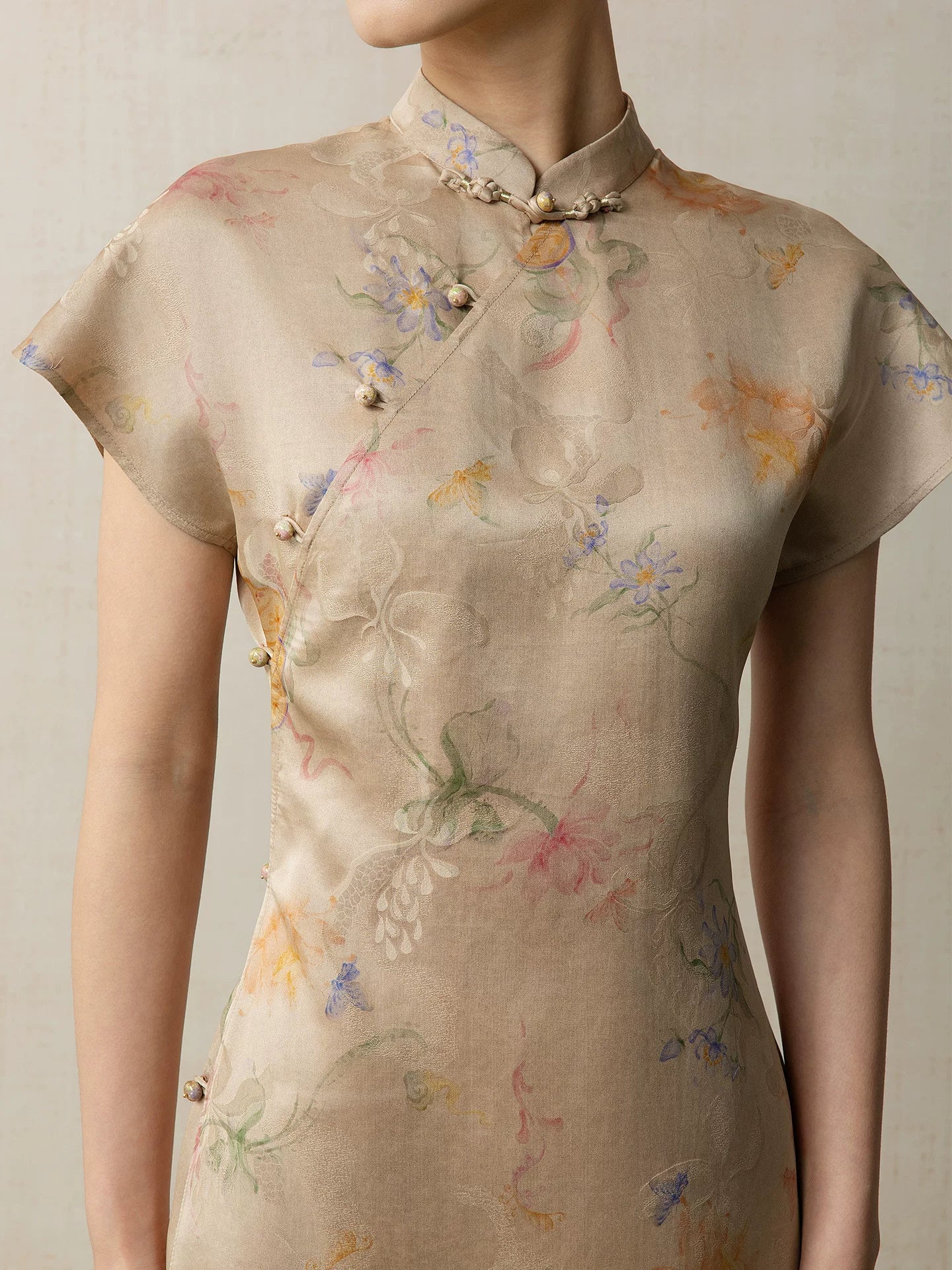 Close-up of mulberry silk floral cheongsam dress with mandarin collar