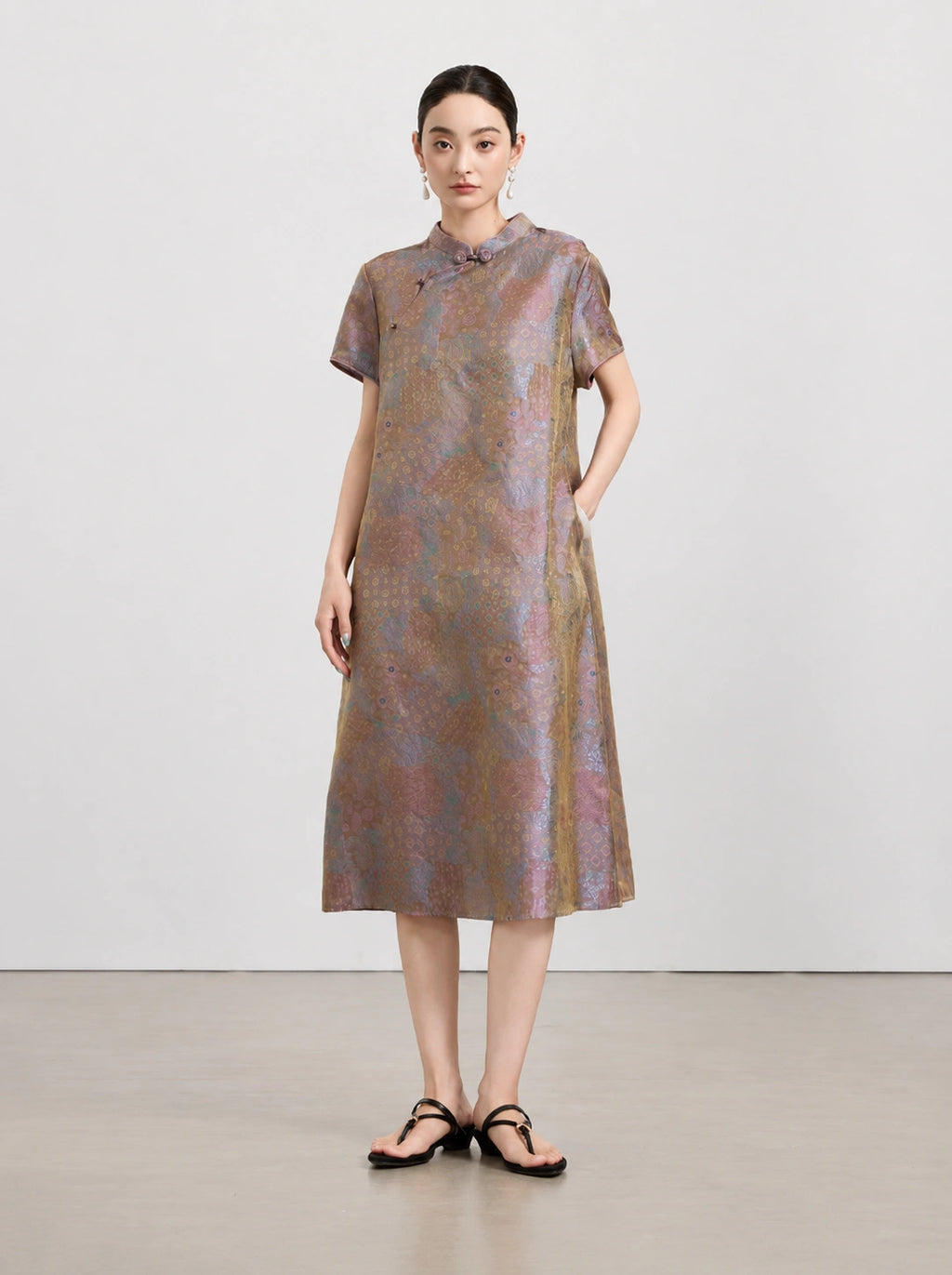 Front view of the New Chinese A-line dress in 100% mulberry silk with a muted multicolor pattern.