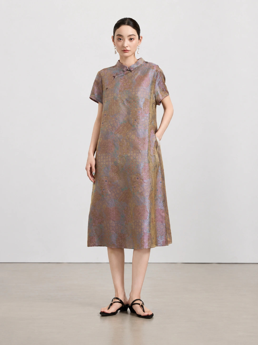 Front view of the New Chinese A-line dress in 100% mulberry silk with a muted multicolor pattern.