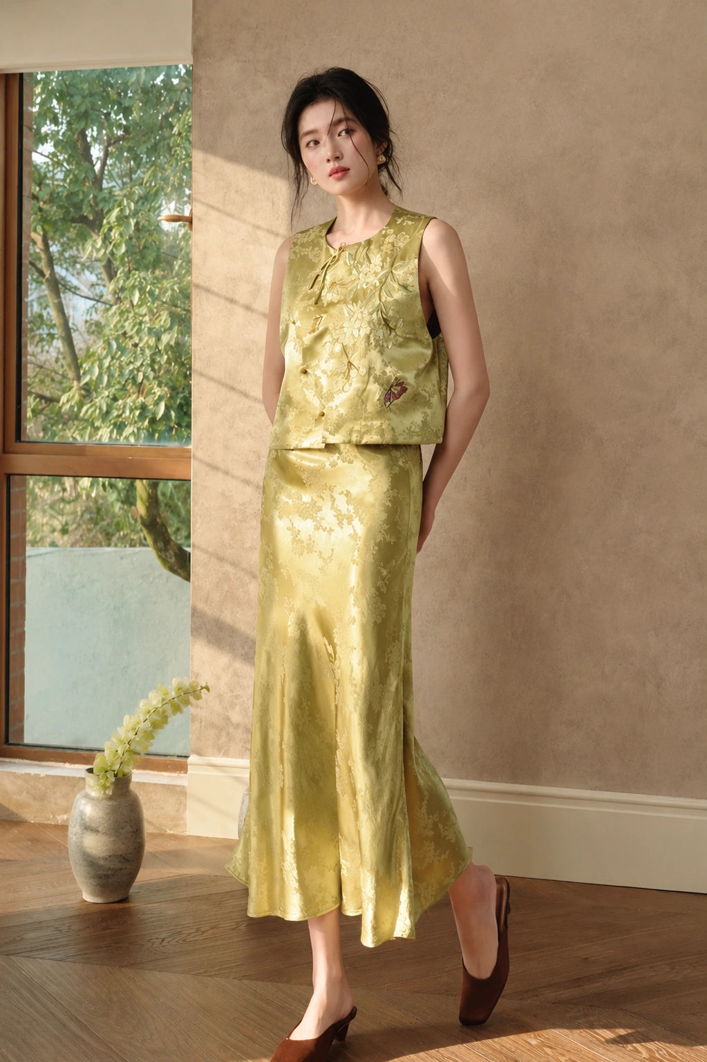 Olive floral-embroidered sleeveless vest styled as an elegant New Chinese summer outfit