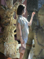 Side view of a relaxed-fit patterned silk-blend top with short straight sleeves